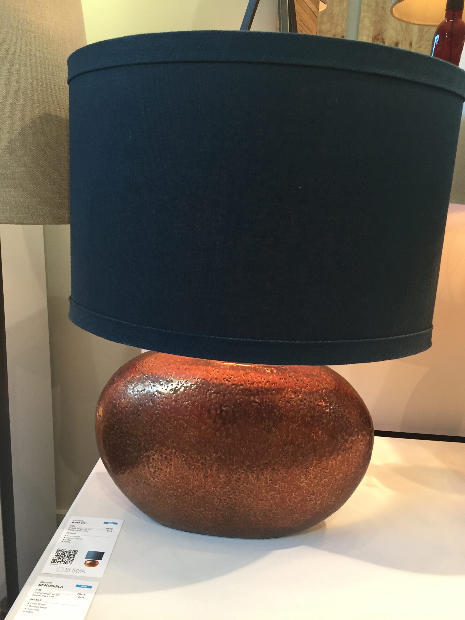 Bold and brassy...well...copper ceramic really! The bold navy blue shade and copper ceramic base from Surya is stunning!