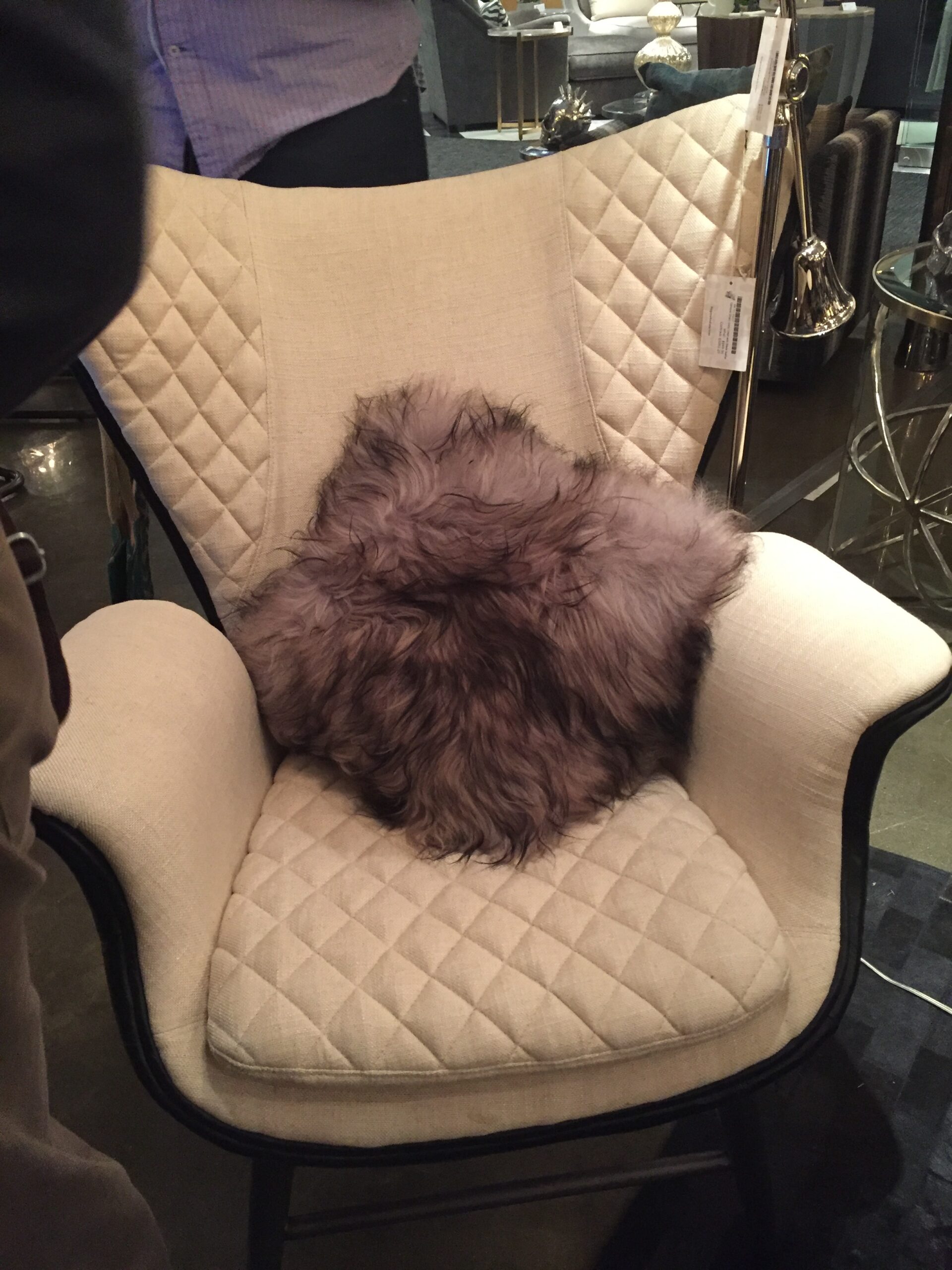 Not your typical tufting, but boy does it make a statement! Love the elements of this chair and fur pillow from Regina Andrew to add the drama necessary for the season.