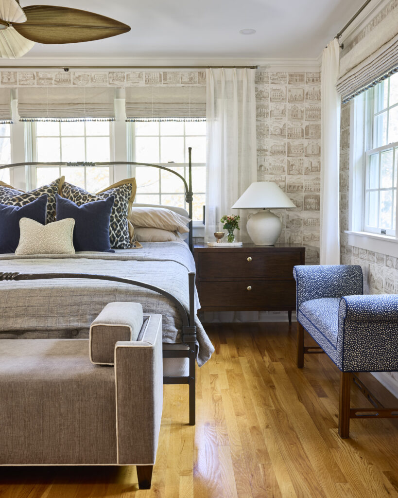 After view of a finished primary bedroom showcasing a timeless primary bedroom design with layered textures, classic furniture, and a calm, cohesive layout.