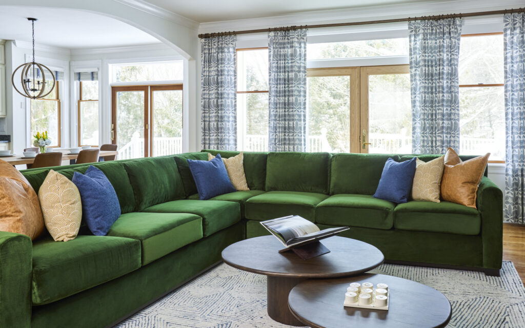 A full home transformation starting with the perfect sofa. Explore this living room, game room, and foyer design for a cohesive, elevated space.